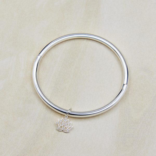 Maia hinged bangle bracelet with lotus connection pendant