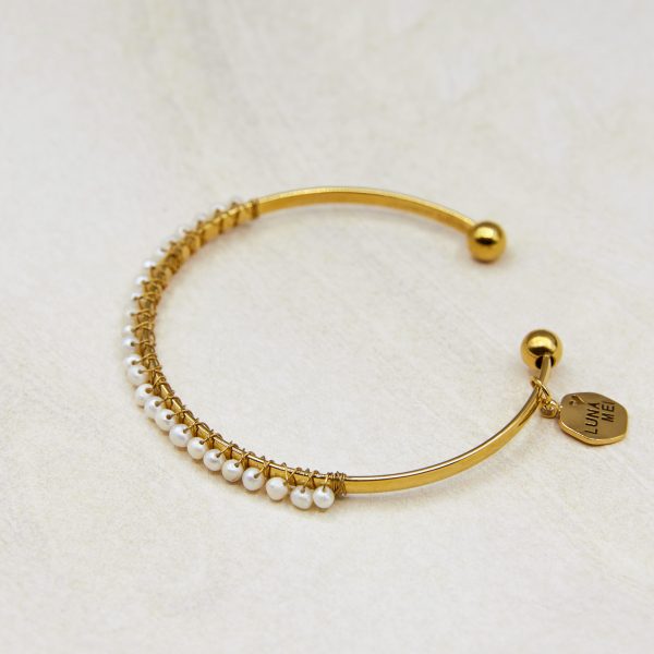 Lune cuff bracelet with delicate freshwater pearl strand