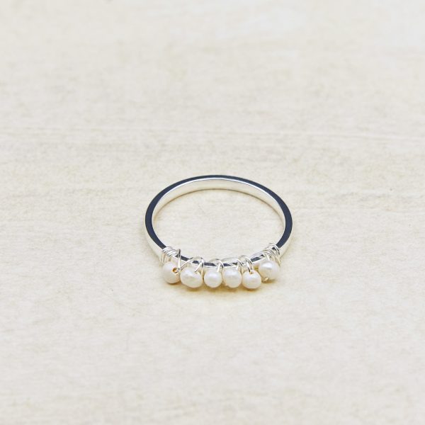 • Arwen pearl ring with tiny freshwater pearls threaded on a fine band